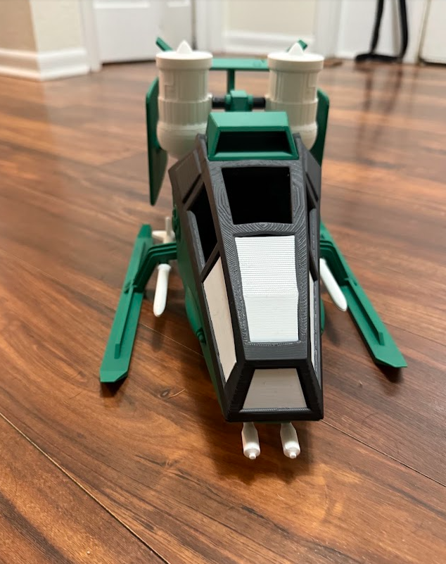 Green, black and white 3D printed sci-fi twin-engine lander craft with landing legs